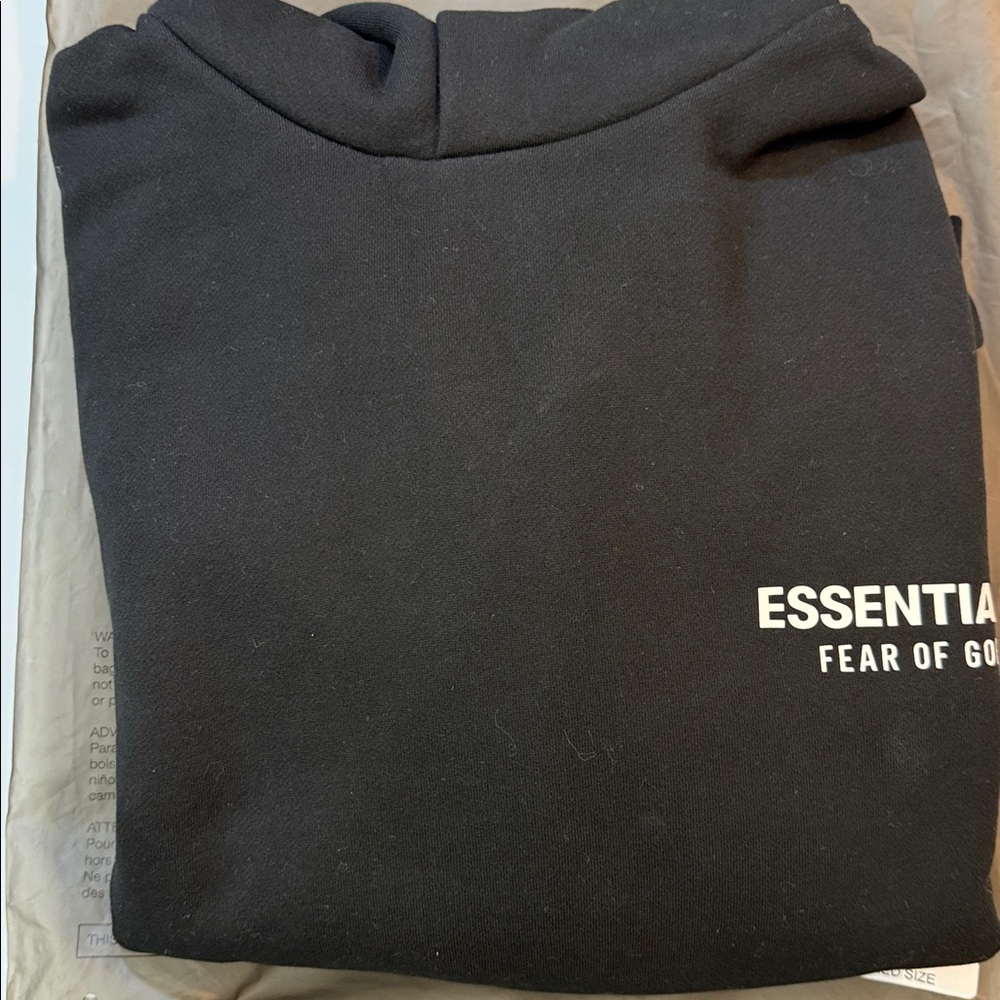 Essentials Fear of God black 2025 collection hoodie